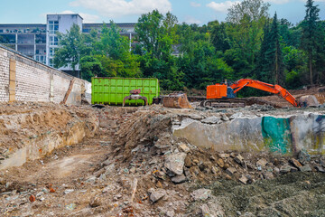 Excavator transforming urban landscape during demolition process