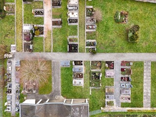 Aerial View of a Small Cemetery with Ordered Graves and Pathways	
