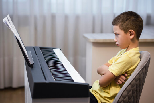 Piano Lessons for Children. Boy doesn&rsquo;t like Piano Lessons. Child Hate Learn Music. Kid wants to quit music lessons. 