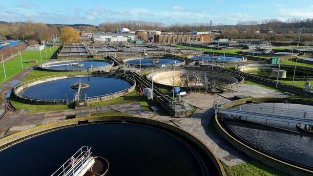 Close up aerial Clarifier Arm in Sewage Treatment Plant, Industrial Close Up of Water Purification and Sanitation Infrastructure in United Kingdom