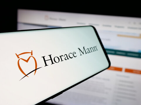 Stuttgart, Germany - 01-16-2026: Smartphone with logo of US company Horace Mann Educators Corporation on screen in front of website. Focus on center-left of phone display.