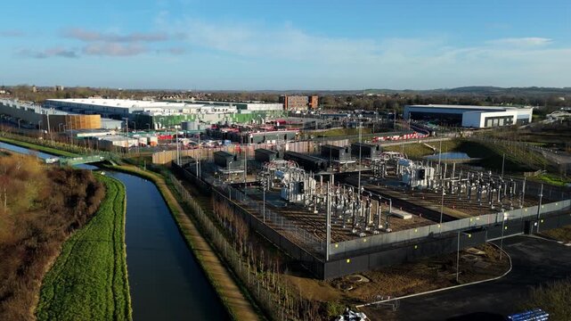 Aerial Drone View of an Electrical Substation with Powerlines and Pylons Supplying Energy to the Waltham Cross Data Center in Hertfordshire UK
