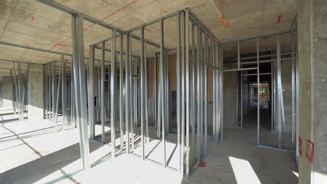 Building in construction. Metal studs for interior drywalls.