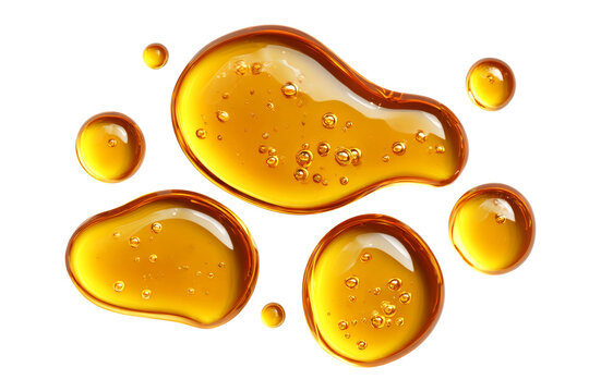 Golden honey droplets with bubbles isolated on transparent background