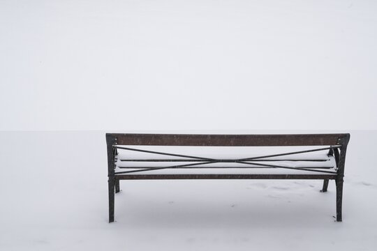 Bench in snow, wintery Turku or Swedish &Aring;bo, Varsinais-Suomi, Finland