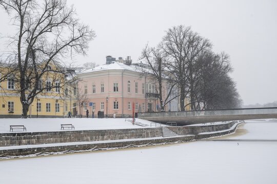Historic buildings on the frozen Aurajoki river, wintery Turku or Swedish &Aring;bo, Varsinais-Suomi, Finland