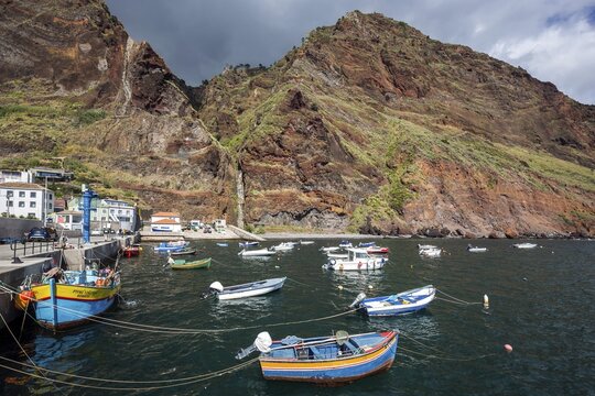 Boat harbour with boats and cliffs, Paul do Mar, Madeira, Portugal