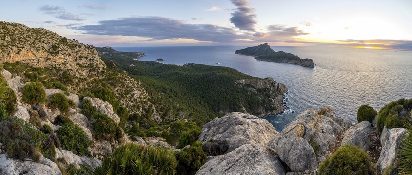 Panorama, view of mountains and coast with sea, at sunset, hiking to La Trapa from Sant Elm, at the back island Sa Dragonera, Serra de Tramuntana, Majorca, Spain