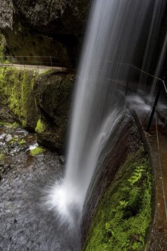 Nova waterfall and Moinho in a gorge, long exposure, Ponta do Sol, Madeira, Portugal