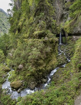 Nova waterfall and Moinho in a gorge, hiking trail at Levada Nova, long exposure, Ponta do Sol, Madeira, Portugal