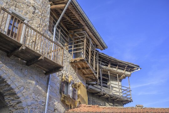 Wooden balcony on an old house, Rango, Bleggio Superiore, Trentino, Italy
