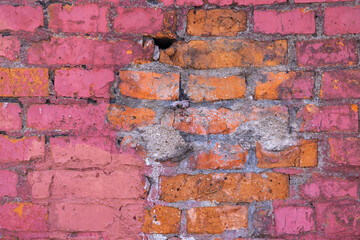 Peeled and weathered red brick texture  