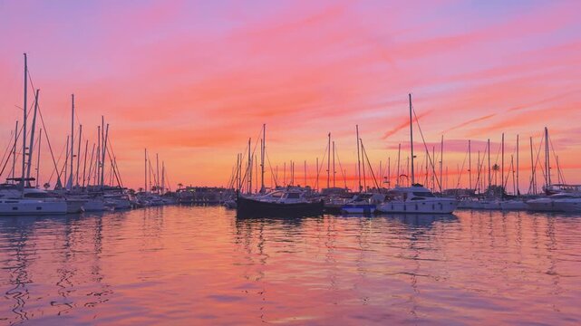 Denia marina sunset with sailboats and Montgo mountain