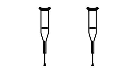A pair of crutches stand upright against a white background silhouette © IMkM00i76