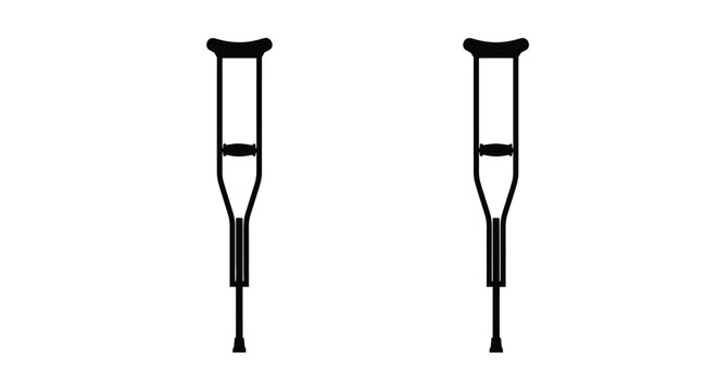 A pair of crutches stand upright against a white background silhouette