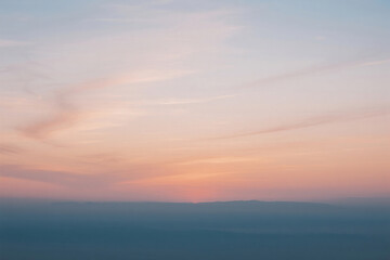 Obraz premium Distant landscape at sunset