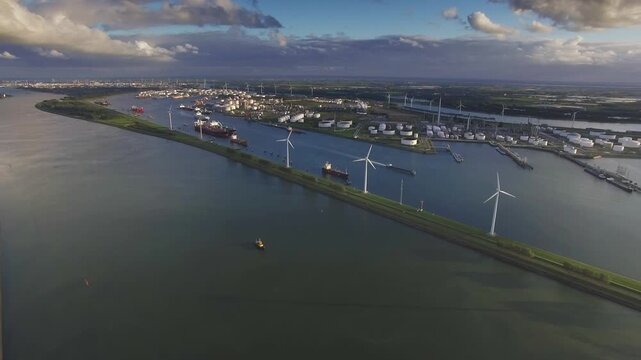 Aerial Drone View of Maeslantkering Storm Surge Barrier and Port of Rotterdam at Sunset, Netherlands