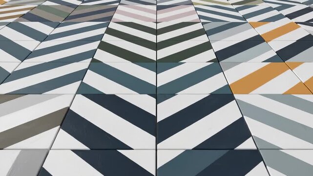 Geometric Patterned Tiles With Diagonal Stripes in Various Colors and Shades