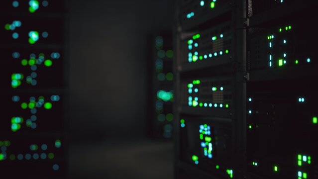 Bright green and blue lights pulse rhythmically from servers inside a dimly lit data center. The atmosphere feels cool and futuristic, showcasing technology at its finest.