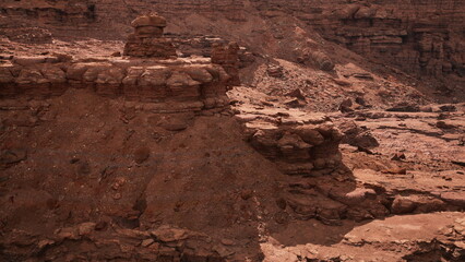 This location features unique rock formations scattered across a stunning desert terrain.