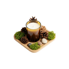 Candle with pine cones and moss on wooden tray