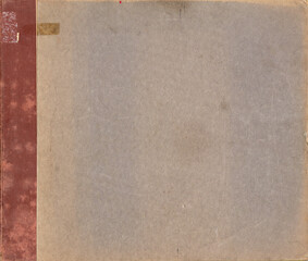 Aged book cover with red cloth spine on gray board