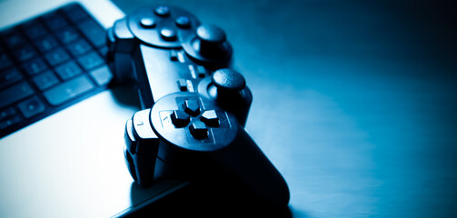 computer keyboard with joystick on black background © Artvibe