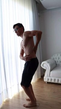 homem com dor nas costas 