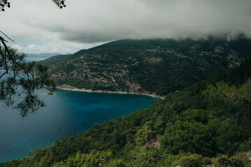 Obraz premium A picturesque bay surrounded by forested mountains in Turkey