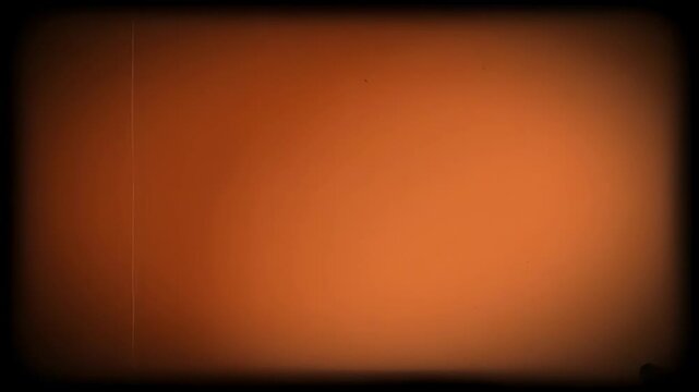 A vintage film texture with a warm, orange hue. Subtle scratches and vignettes add to the retro aesthetic.
