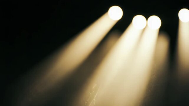 Golden light rays illuminating numerous small dust particles, creating a deep atmospheric effect representing concepts like hope, spirituality, and divine intervention