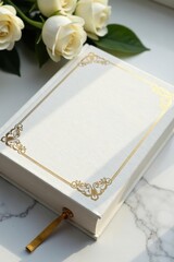 Elegant white book, golden floral accents on marble , macro, book, still life