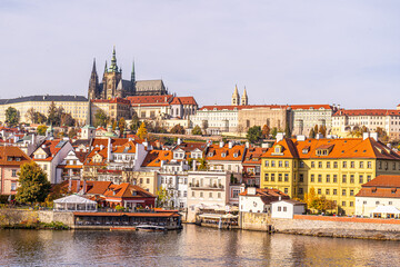 Prague Vltava water River in Czechia from Charles Bridge Praha Castle Old Town roofs.