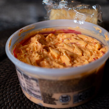 Pimento cheese and crackers with plastic wrapper. 