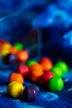 Colorful small candies with copy space to the upper right section.