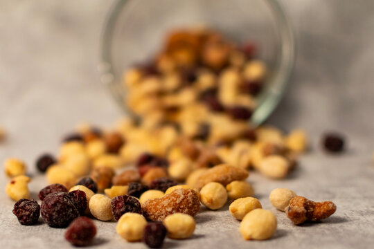 Trail mix on a grey background.  