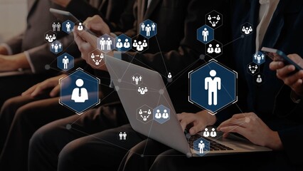 Business People Engaged in Networking with Digital Devices and Online Interactions for Modern...