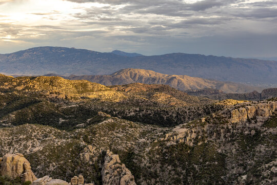 Golden sunset view from Mount Lemmon rocky ridges