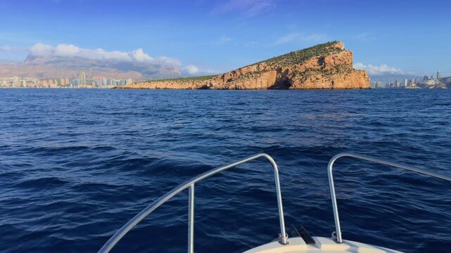 Benidorm Island and city skyline from boat Costa Blanca Spain