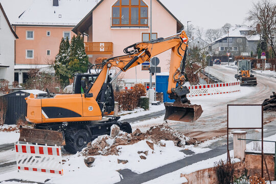 excavator in snow. 
