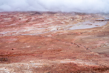Hot water vapor rises from the Gunnuhver geothermal area on the Reykjanes Peninsula on a day in March.
