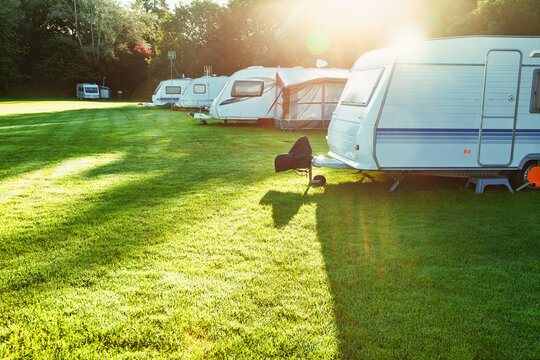 Caravans parked on sunny campsite in Scotland UK