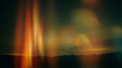 Ethereal celestial background with vibrant orange, yellow, and teal colors, depicting abstract light flares and a starry night.