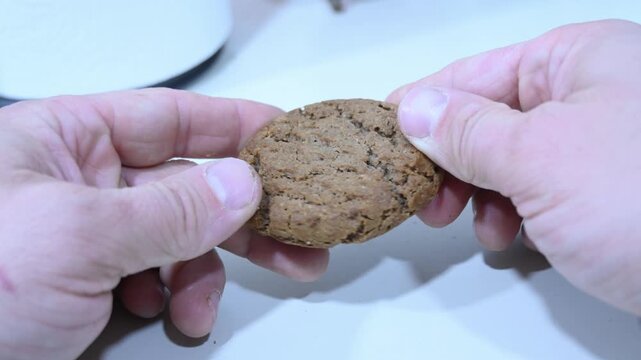 Broken Cookie Split in Half in Hands | Close-Up Crumbly Break