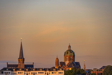 view of the village of Hoorn with church at sunset
