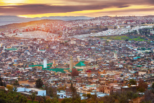 Morocco,  the Medina of Fes el Bali, aerial view of the old town at the first light of dawn