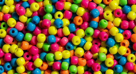 Obraz premium Close-up of colorful plastic beads for crafts and jewelry making