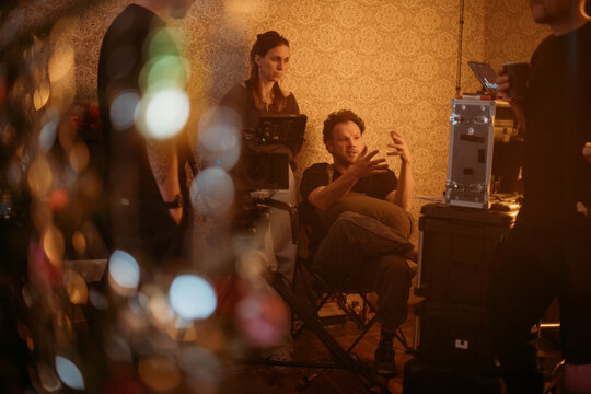 Film set, monitors and modern shooting equipment. Film crew, lighting devices, monitors, playbacks - filming equipment and a team of specialists in filming movies, advertising and TV series