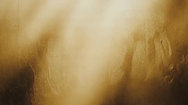 Luxurious gold surface with subtle undulating textures and warm gradient lighting, creating an elegant, shimmery backdrop ideal for design, wallpaper, or premium branding
