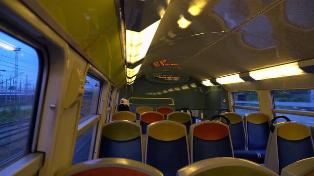 A suburban train running in the outskirts of Paris, France.
